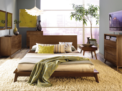 Catalina 6 Drawer Dresser in walnut in decorated bedroom with bed, nightstand, and chest