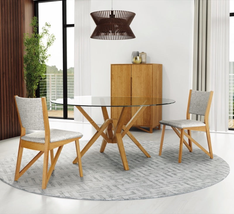 Exeter Glass Top Round Dining Cherry in decorated dining room with cabinet and chairs