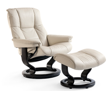 Luxurious  leather recliner in Paloma Fog color with a classic base black wood  and adjustable ottoman 