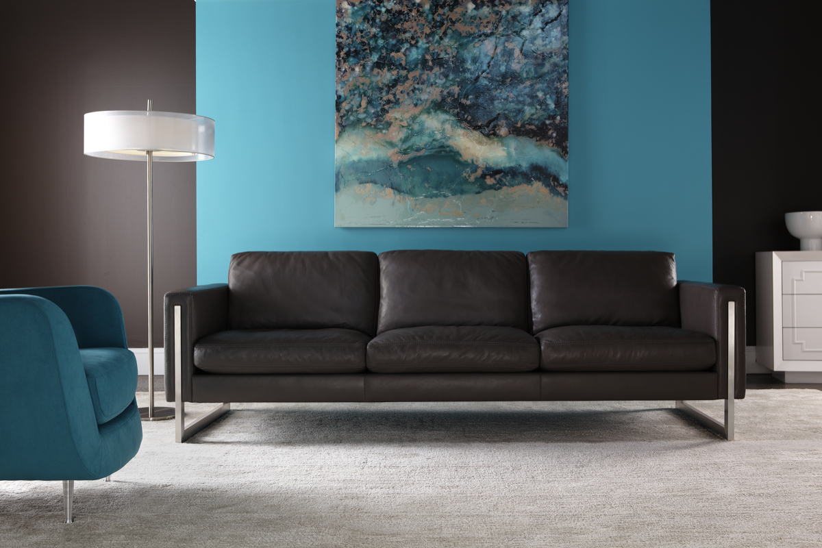 Room view of the Savino Sofa in black leather, highlighting its modern design and elegance in a contemporary setting
