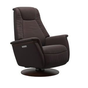 Modern light grey recliner chair with padded cushions and a round dark brown wood base 