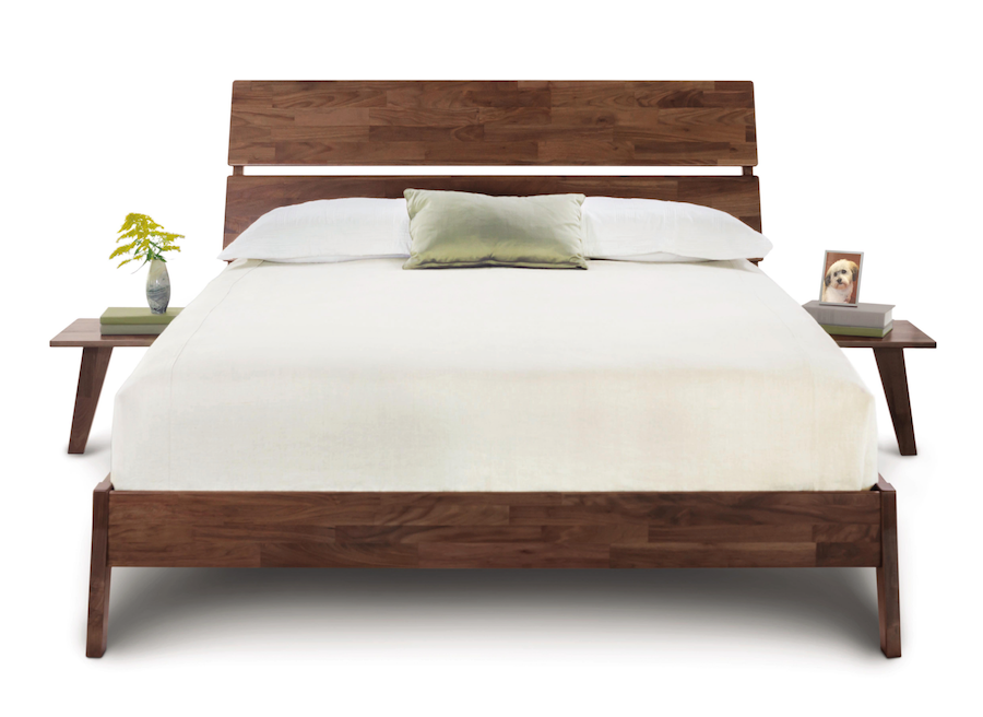 Front view Linn Platform Bed with slatted headboard,  and angled legs with 2 floating nightstands attached to either side of bed. 
