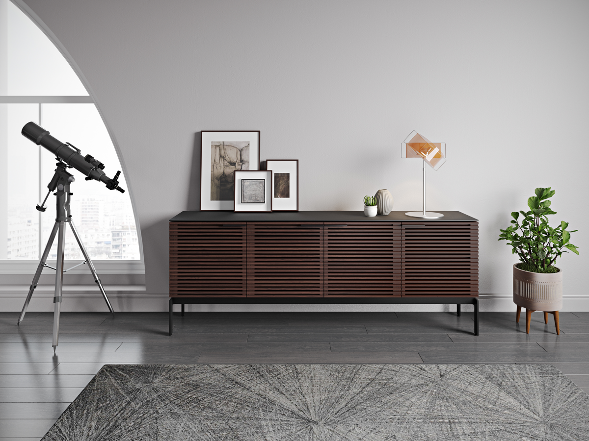 Corridor 7129 Console in room with picture frames and light on top 