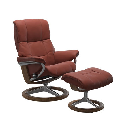 Luxurious  leather recliner in dark henna color with a signature teak wood and adjustable ottoman 