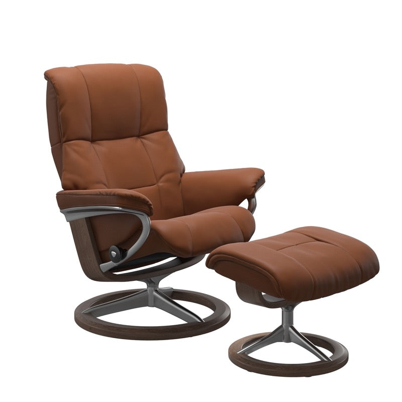 Luxurious  leather recliner in cognac color with a signature walnut wood and adjustable ottoman 