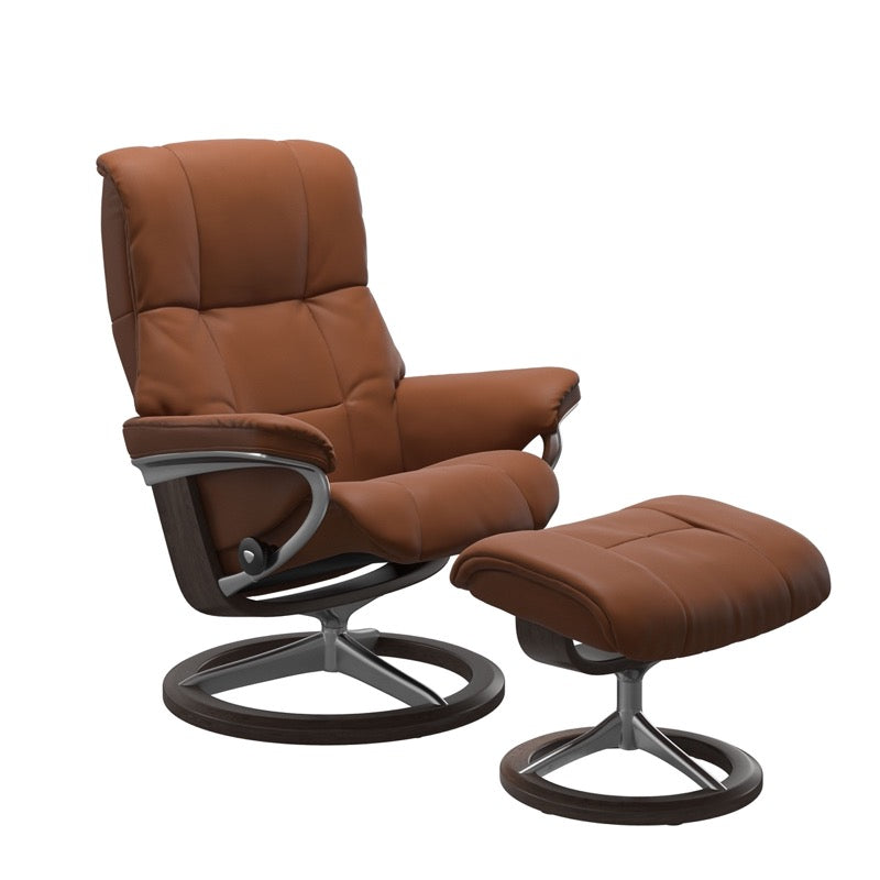 Luxurious leather recliner in Paloma 
 new cognac color with a signature wenge wood and adjustable ottoman.
