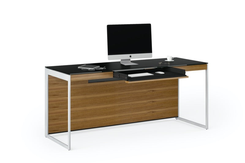 Front view of the Sequel 20 6101 Desk by BDI Furniture in Natural Walnut finish with a Computer, Ipad, and mug.