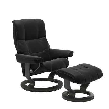 Luxurious  leather recliner in Paloma black color with a grey wood classic base and adjustable ottoman 