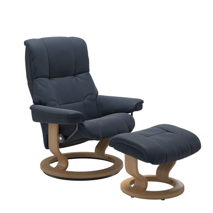 Luxury and Modern recliner with ottoman in oxford blue with a classic ring bottom in oak wood. 