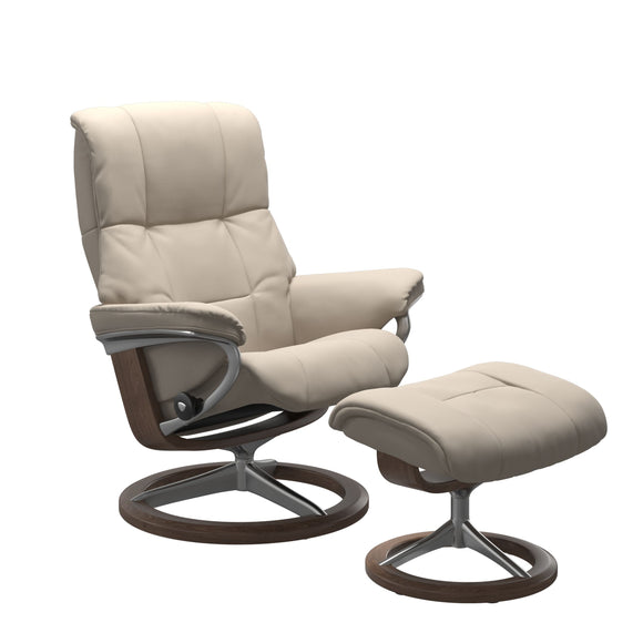 Luxurious  leather recliner in Paloma Fog color with a signature round base with walnut wood and adjustable ottoman  