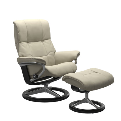 Luxurious leather recliner in Paloma light grey color with a signature round base with black wood and adjustable ottoman.