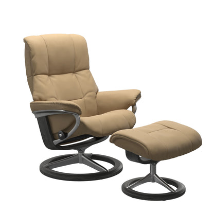 Luxurious leather recliner in Paloma sand color with a signature grey wood and adjustable ottoman.