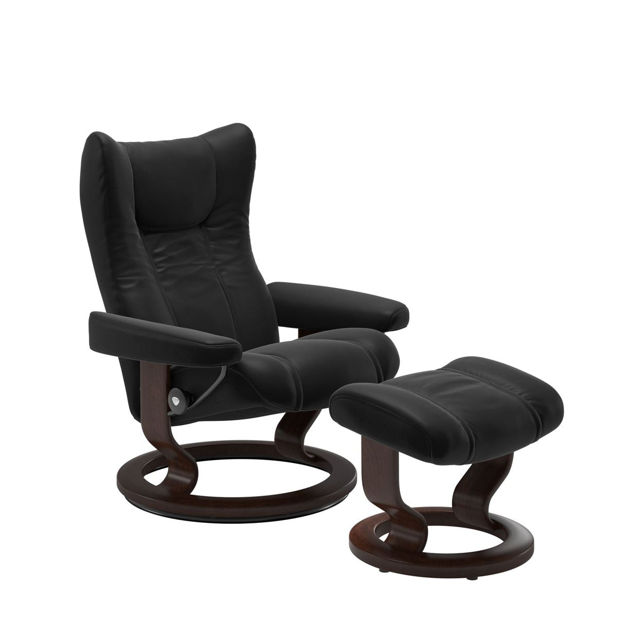 Modern reclining chair with matching ottoman, featuring black upholstery, and classic round wooden base in brown with padded armrest. 