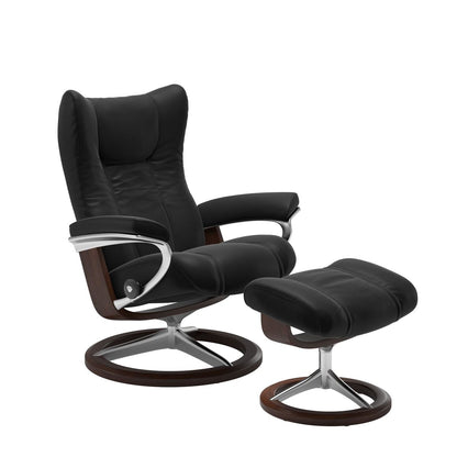 Stressless Wing Small Recliner in Paloma black and Ottoman with Classic Base in brown