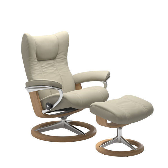 Modern reclining chair with matching ottoman, featuring light grey upholstery, oak wood and metal accents. 