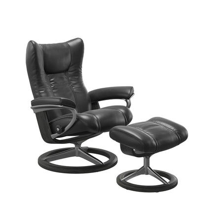 Stressless Wing Small Recliner in pioneer black and Ottoman with Classic Base in grey