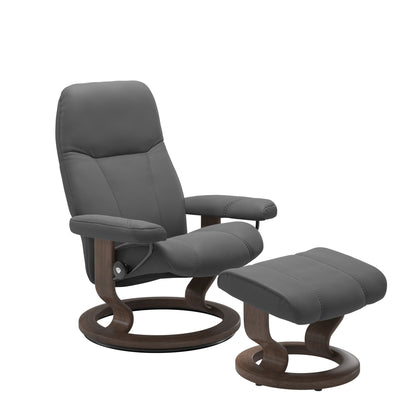 Front view of Stressless Consul Large Recliner and Ottoman in Batick Grey with Classic Walnut Base