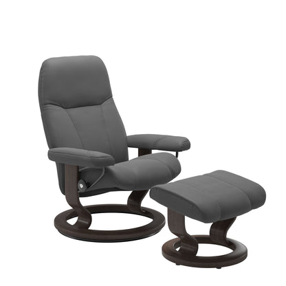 Front view of Stressless Consul Medium Recliner and Ottoman in Batick Grey with Classic Wenge Base