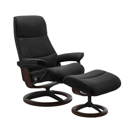 View recliner in Paloma Black with curved base in metal and brown