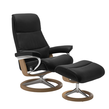 View recliner in Paloma Black with curved base in metal and oak