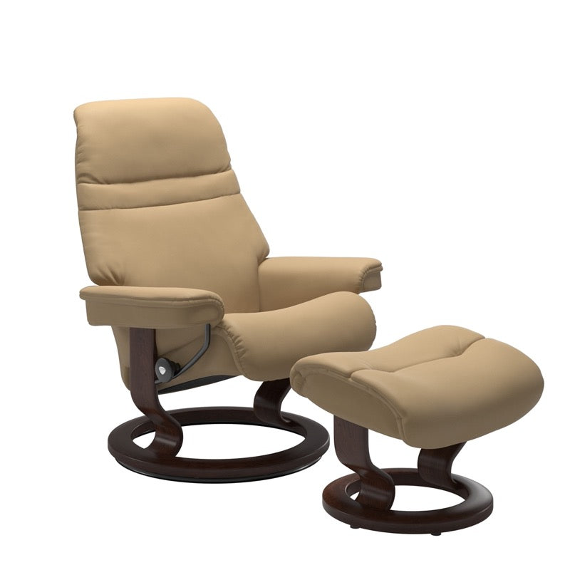 Sand colored sunrise recliner with matching ottoman both featuring a circular base in brown wood. 