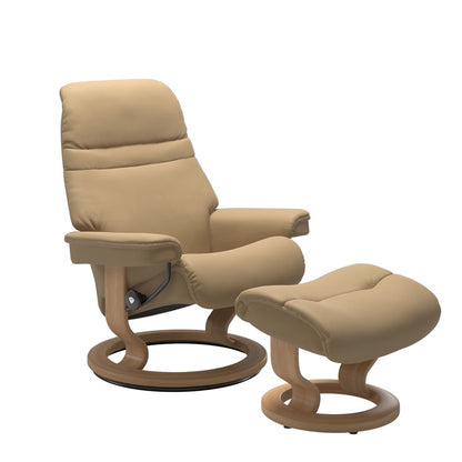 Sand colored sunrise recliner with matching ottoman both featuring a circular base in oak wood 