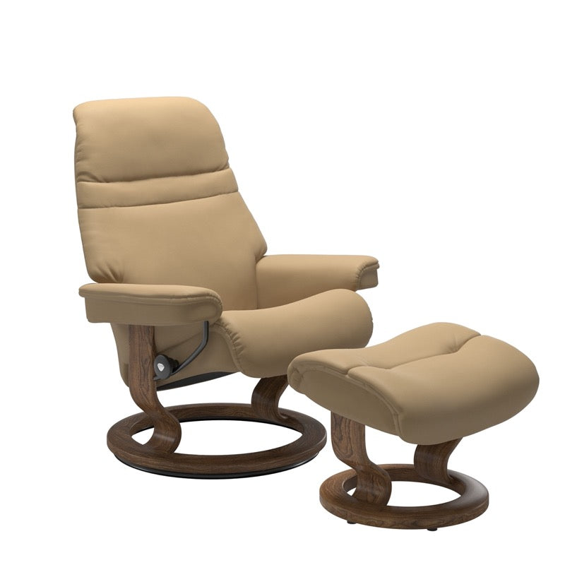 Sand colored sunrise recliner with matching ottoman both featuring a circular base in teak wood. 