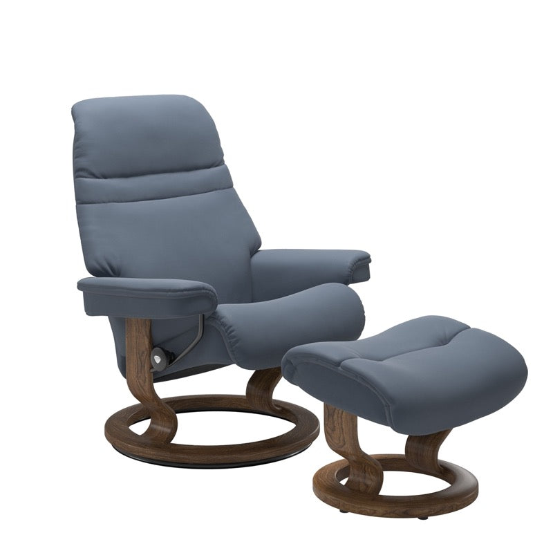 Sparrow Blue colored sunrise recliner with matching ottoman both featuring a circular base in teak wood. 