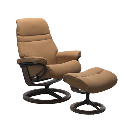 Taupe colored sunrise recliner with matching ottoman featuring a curved base in metal and wenge
