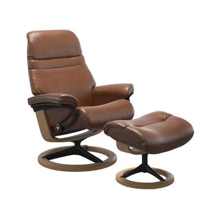 Pioneer Olive Brown colored sunrise recliner with matching ottoman featuring a curved base in metal and oak