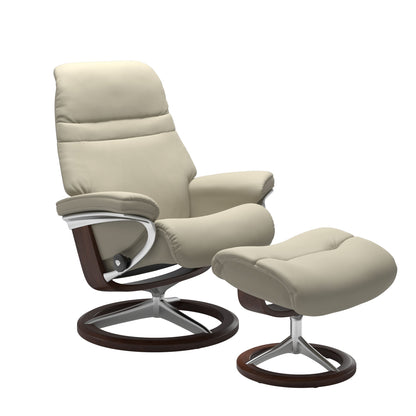 Light Grey colored sunrise recliner with matching ottoman featuring a curved  brown wood and metal base