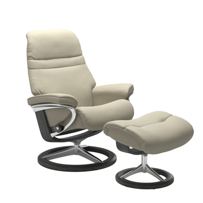 Light Grey colored sunrise recliner with matching ottoman featuring a curved grey wood and metal base