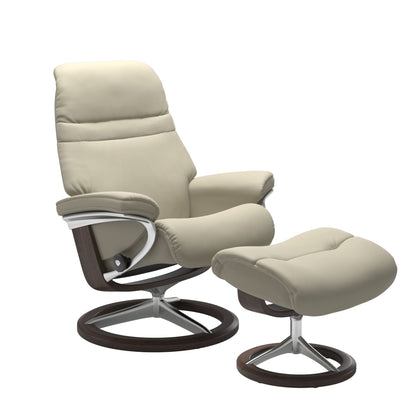 Light grey colored sunrise recliner with matching ottoman featuring a curved  wenge wood and metal base