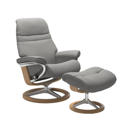 Silver Grey colored sunrise recliner with matching ottoman featuring a curved  oak wood and metal base
