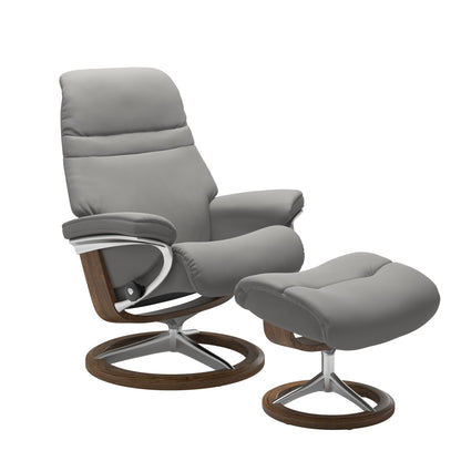 SIlver grey colored sunrise recliner with matching ottoman featuring a curved  teak wood and metal base