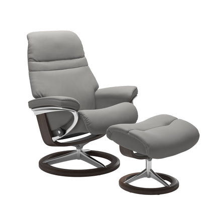 Silver Grey colored sunrise recliner with matching ottoman featuring a curved  wenge wood and metal base