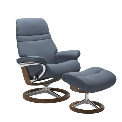 Sparrow Blue colored sunrise recliner with matching ottoman featuring a curved  teak wood and metal base