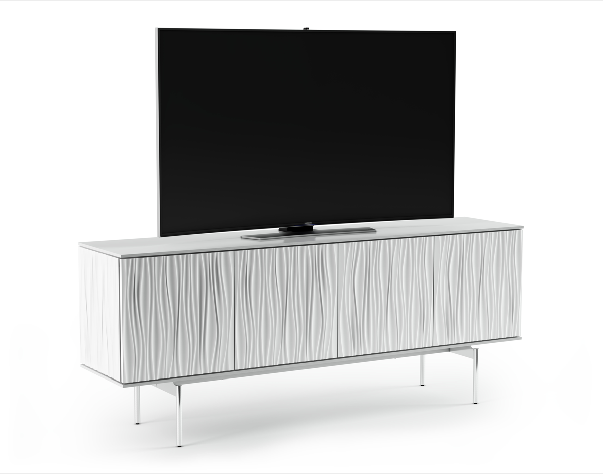 Modern white sideboard with wavy texture look with stainless steel legs and TV on top. 
