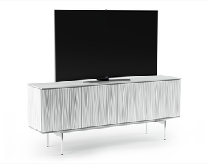 Modern white sideboard with wavy texture look with stainless steel legs and TV on top. 