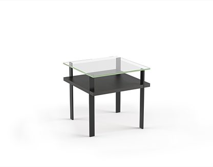 Modern glass top side table with charcoal stained ash wood shelf and black metal legs 